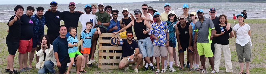 The Chiba Sharks family enjoying a BBQ by the sea