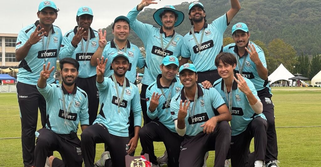 The victorious JCL T20 side with the trophy